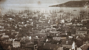 San Francisco black and white historical photo of Jackson Street and ships